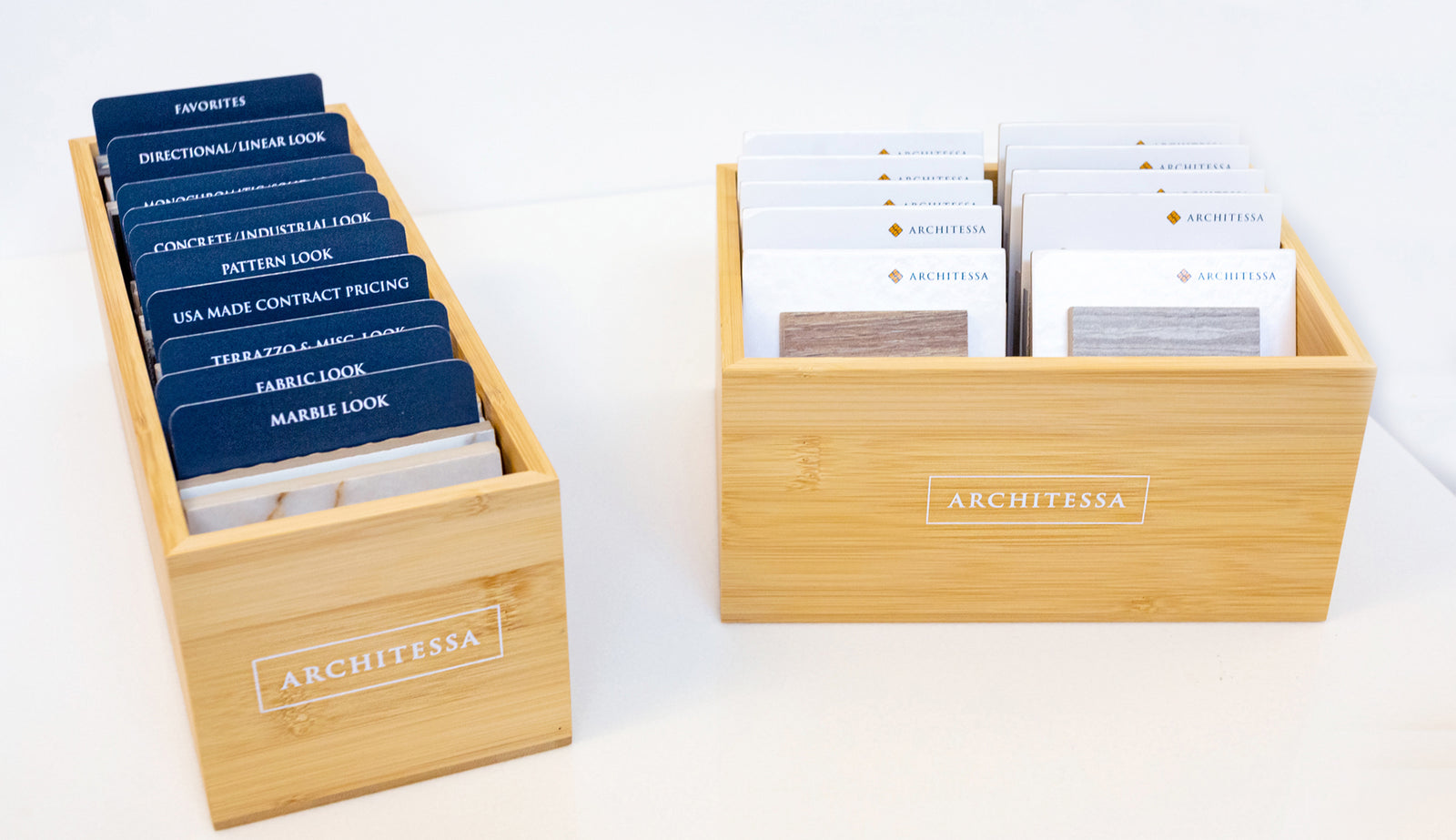 two bamboo wooden boxes filled with library board tabs and sample swatch cards